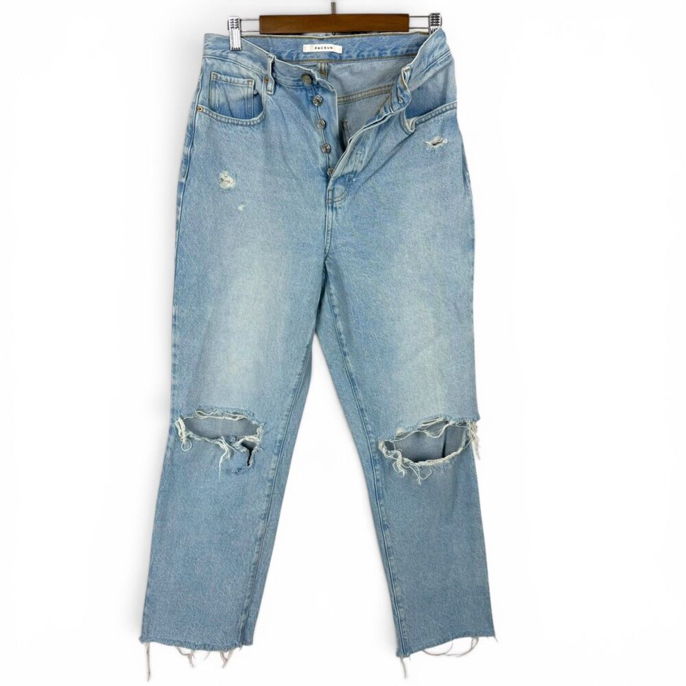 high-waisted dad jeans light wash denim with heavy distressing raw hem rips 29